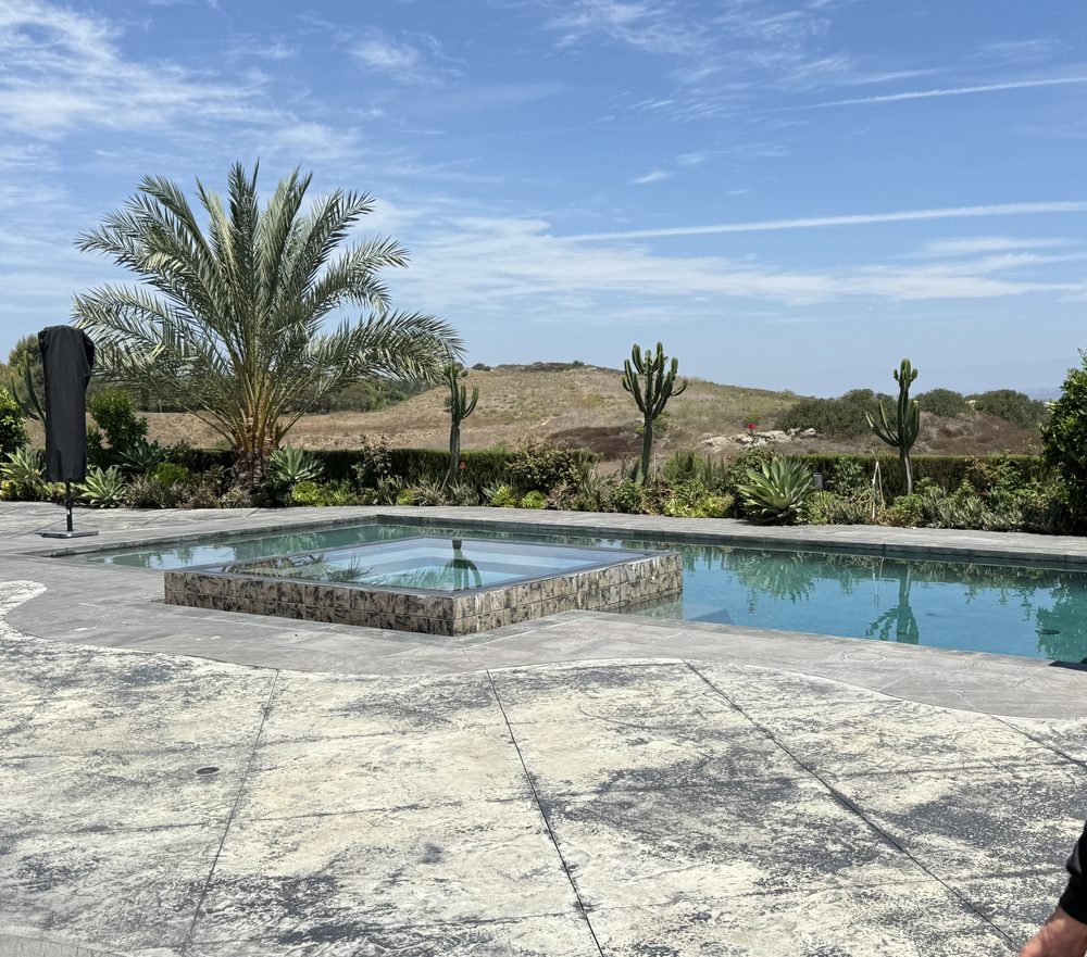 Custom pool and raised spa with hilltop view in Irvine